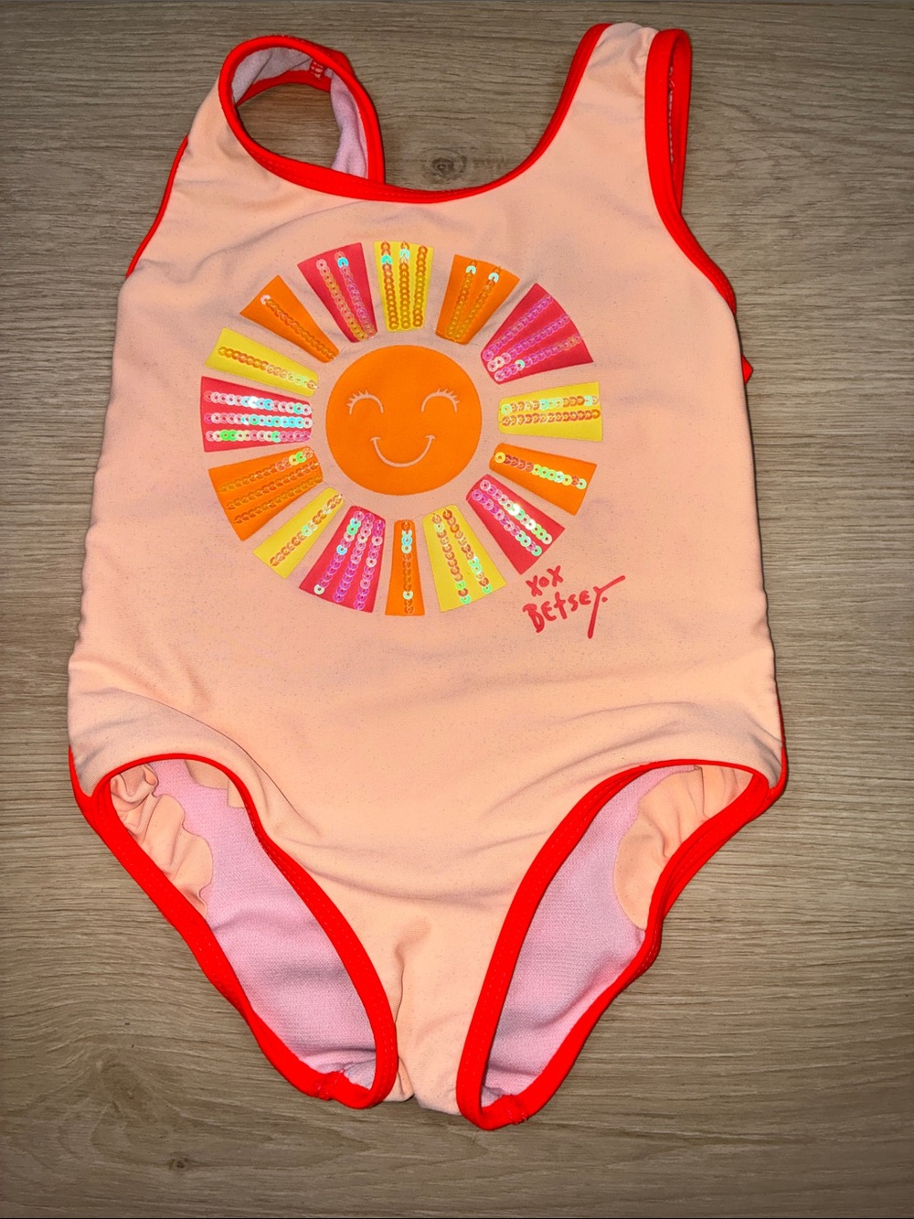 Betsey Johnson Peach One-Piece Swimsuit with Orange Sun and Red Trim